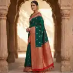 Peacock Teal Satin Silk Saree with vermilion red copper zari pallu and woven motifs