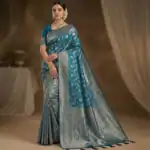 Neelambara Shobha Satin Silk Saree peacock teal blue with copper zari pallu and woven motifs